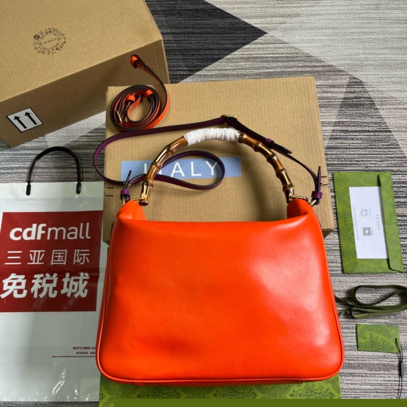 G*u*i top handle bags